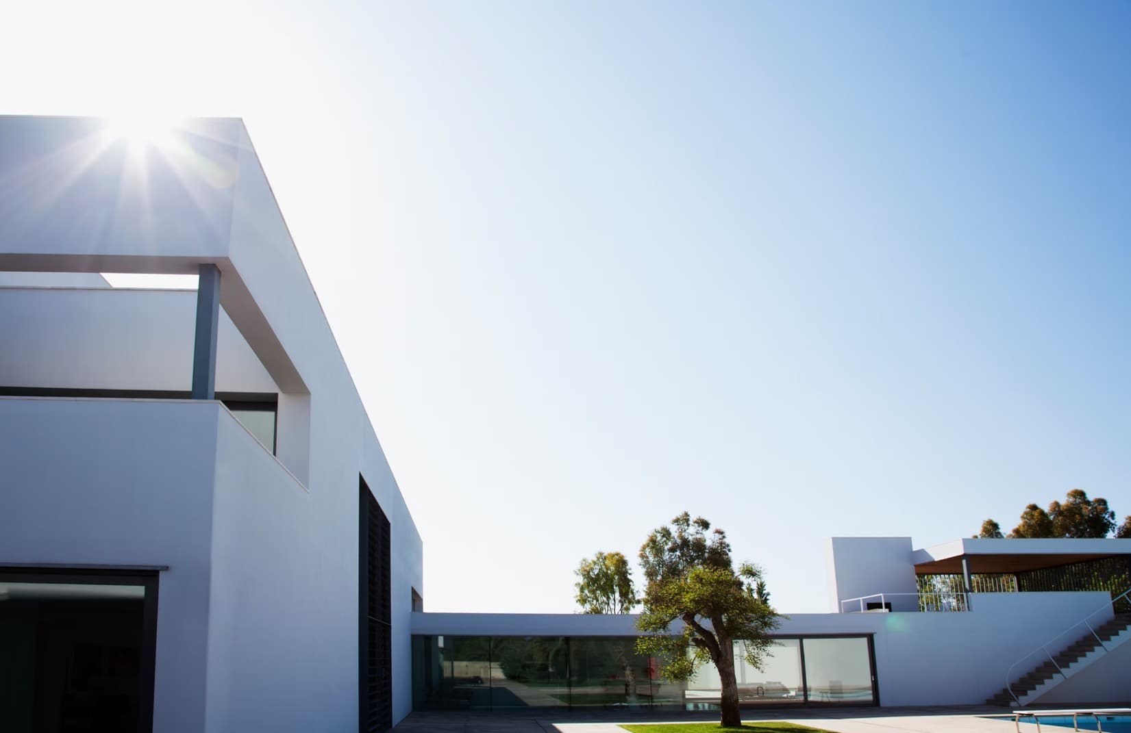 Modern white building under bright Sarawak sky